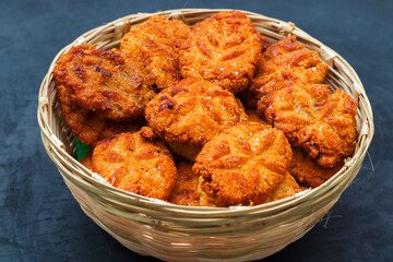 Crispy homemade Thekua made with jaggery, a traditional Bihari sweet for Chhath Puja.